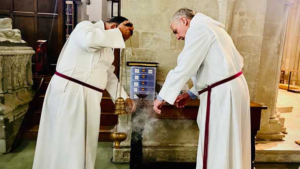 servers lighting incense